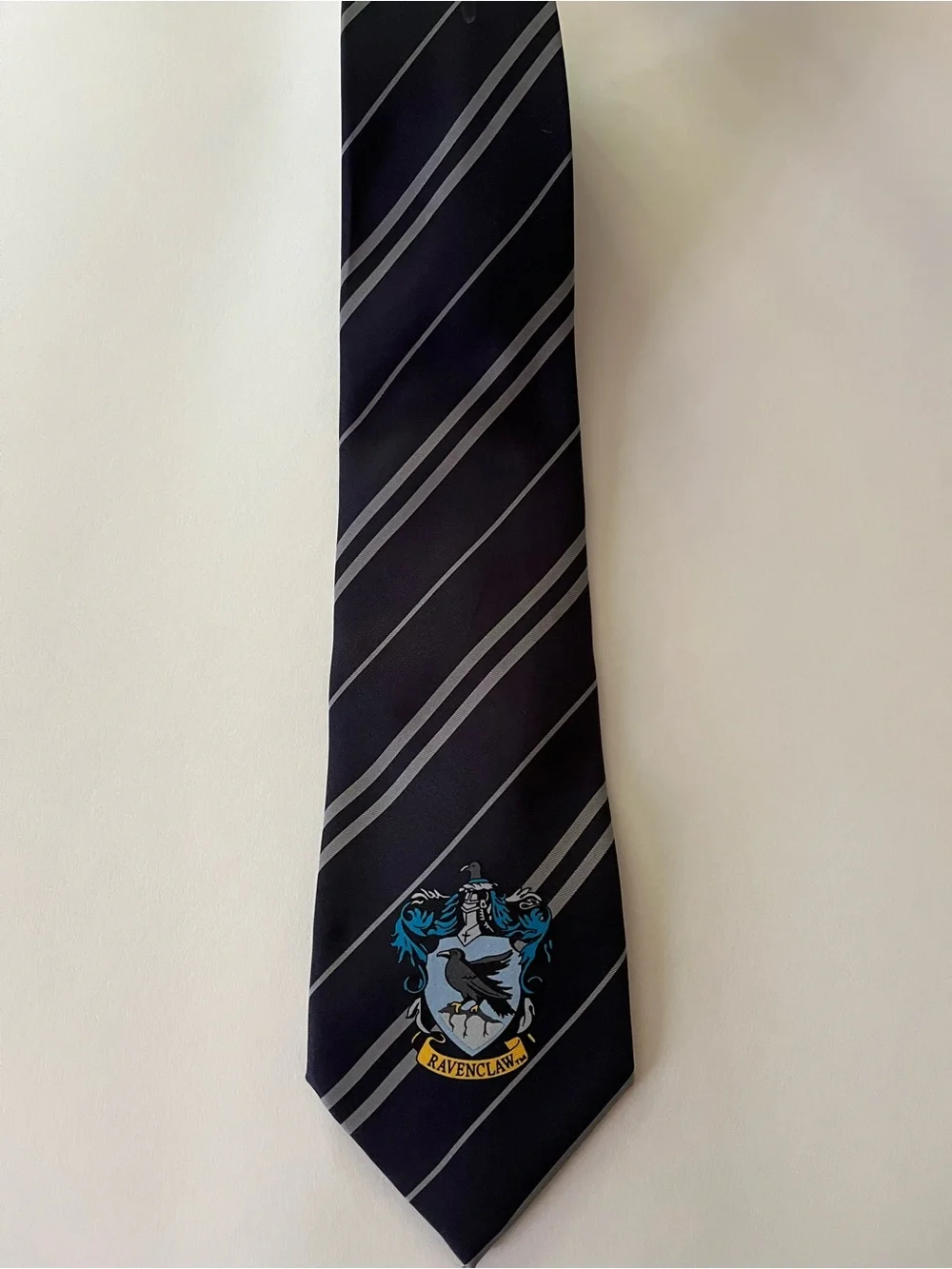 Harry Potter Ravenclaw Crest Diagonal Stripe Tie - Black & Gray with Blue Accent